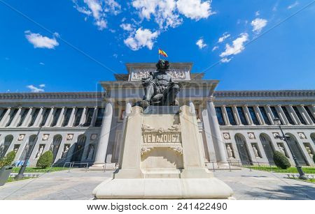 MADRID, SPAIN - MAY 15, 2018:  Entrance of El Prado museum with a Statue of Velazquez