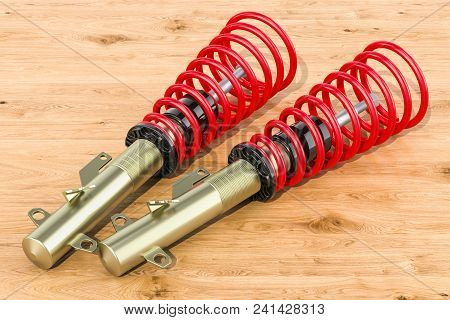 Set Of Rear Shock Absorbers On The Wooden Table, 3d Rendering