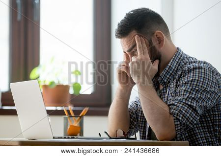 Frustrated Businessman Concerned Male Worker Looking At Laptop Screen Heavily Thinking About Problem