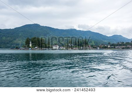 Lake Toba Is A Large Natural Lake Occupying The Caldera Of A Supervolcano, Located In The Middle Of 