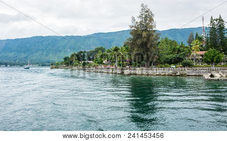 View Of Island Samosir On Lake Toba, Located In The Middle Of The Northern Part Of The Indonesian Is