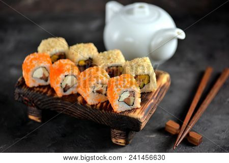 Sushi Philadelphia And California On A Wboard.ooden Olive