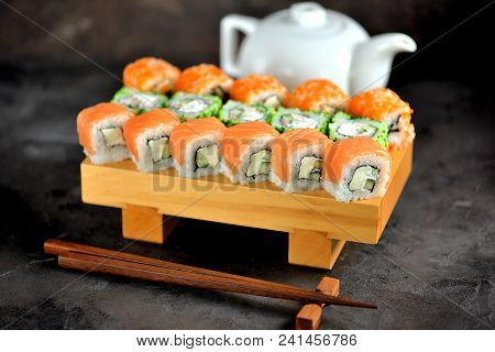 Sushi Philadelphia And California On A Wboard.ooden Olive