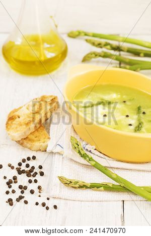 Asparagus Soup With A Toast Bread And Olive Oil