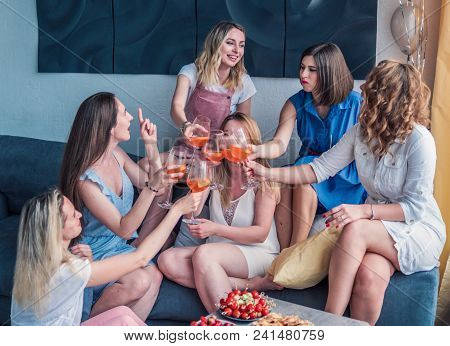Girls Party. Beautiful Women Friends Having Fun At Bachelorette Party. They Are Celebrating And Drin