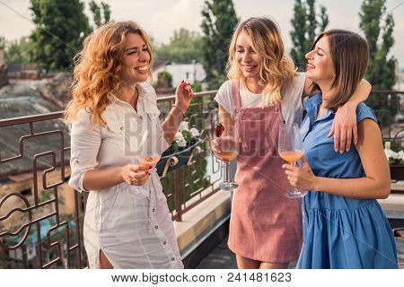 Girls Party. Beautiful Women Friends On The Balcony Having Fun At Bachelorette Party. They Are Celeb