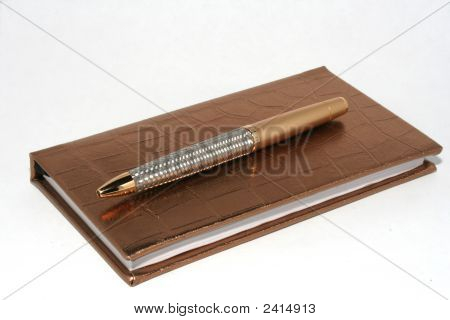 Caneta e livro