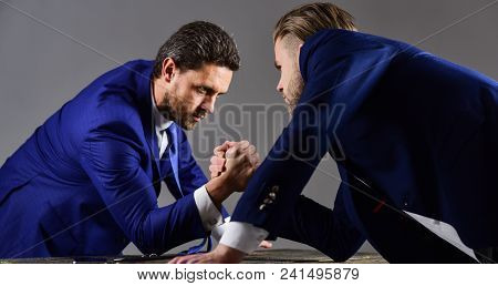 Business Competition Concept. Businessmen Fighting For Leadership. Confrontation Of Business Leaders