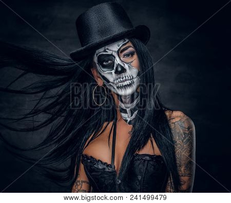 Portrait Of Zombie Woman With Painted Skull Face.