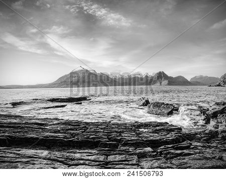 Rocks Near Elgol,  Loch Scavaig,  Isle Of Skye Scotland. Warm Sunset Colors In Cold February Evening