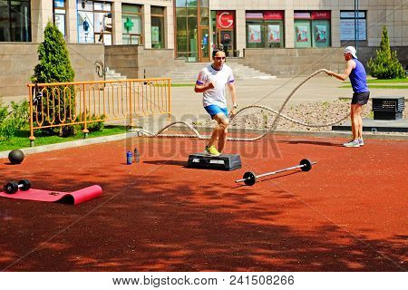 Saint-petersburg. Russia. 05.17.2018.sports Young People Do Some Crossfit Exercises With Ropes Outdo