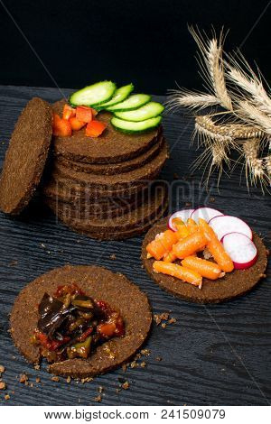 Towel Of Black Bread Gallets With Vegetables - Cucumber, Radish, Red Paprika, Mini Carrot, Eggplant 