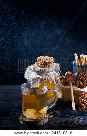 A Fragrant Flower Tea With Delicious Cookies On The Table