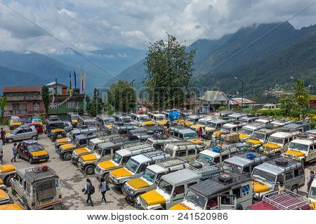 Sikkim, India - April 24, 2017: Tourist jeeps parking Pelling, Sikkim, Northern India. Those jeeps commonly used as public transport between remote areas in Sikkim states