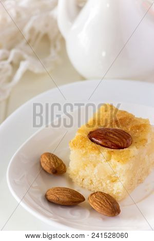 Piece Semolina Cake Basbousa Traditional Arabic With Nuts Orange Blossom Water Vertical Copy Space W
