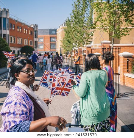 Windsor, United Kingdom - May 19, 2018: Womens With Flags At Royal Wedding Marriage Celebration Of P