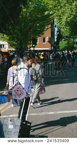 Windsor, United Kingdom - May 19, 2018: Man Sells Royal Couple Portrait Souvenirs During Royal Weddi