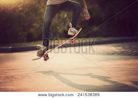 One Young Skateboarder Sakteboarding On Parking Lot