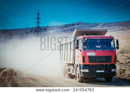Mist Of Dust On The Country Road After Big Car Passing.