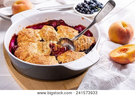 Freshly Baked Peach And Blueberry Cobbler. Homemade Fruit Pie.
