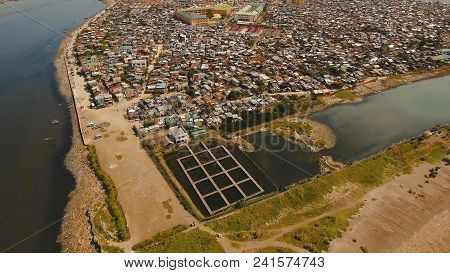Aerial View Poor District Of Manila Slums, Ghettos, Wooden Old Houses, Shacks. Slum Area Of Manila, 