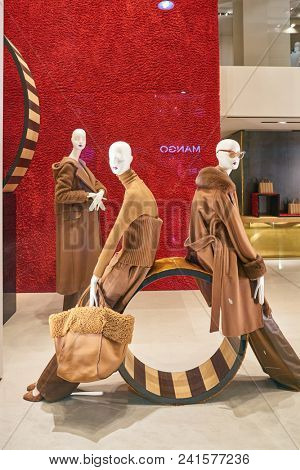 MILAN, ITALY - CIRCA NOVEMBER, 2018: shop window display of clothing at MaxMara store in Milan, Italy.
