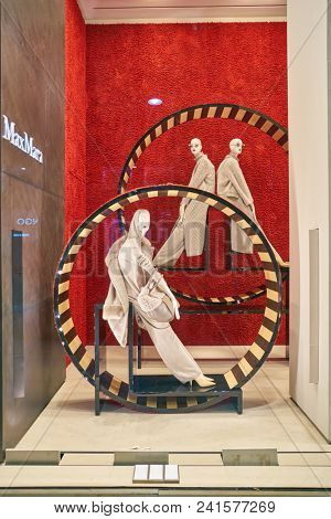 MILAN, ITALY - CIRCA NOVEMBER, 2018: shop window display of clothing at MaxMara store in Milan, Italy.
