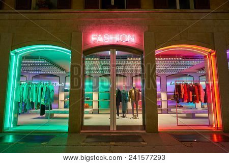 MILAN, ITALY - CIRCA NOVEMBER, 2018: shop windows display of clothing at a store in Milan, Italy.