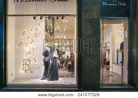 MILAN, ITALY - CIRCA NOVEMBER, 2018: shop window display of clothing at a Massimo Dutti store in Milan, Italy.