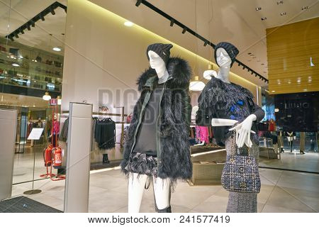MILAN, ITALY - CIRCA NOVEMBER, 2018: shop window display of clothing at a store in Milan, Italy.