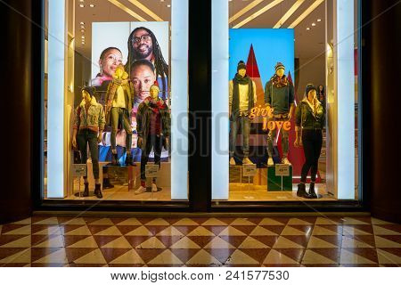 MILAN, ITALY - CIRCA NOVEMBER, 2018: shop windows display of clothing at GAP store in Milan, Italy.