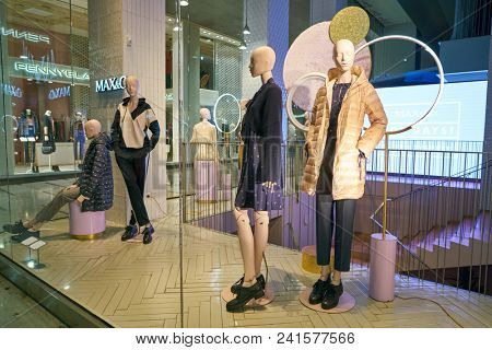 MILAN, ITALY - CIRCA NOVEMBER, 2018: shop window display of clothing at MAX&Co store in Milan, Italy.