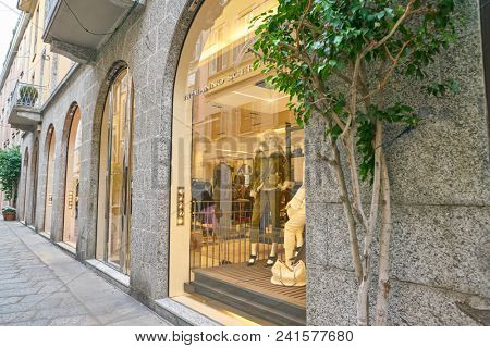 MILAN, ITALY - CIRCA NOVEMBER, 2018: shop windows display of clothing at a store in Milan, Italy.