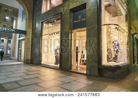 MILAN, ITALY - CIRCA NOVEMBER, 2018: shop windows display of clothing at a Massimo Dutti store in Milan, Italy.