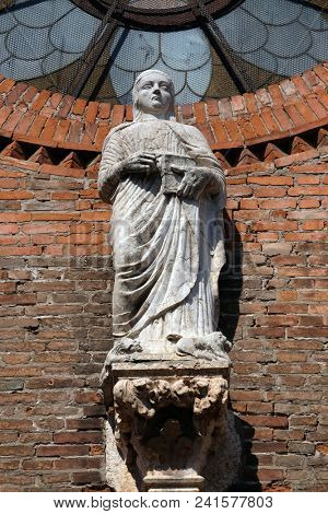 VERONA, ITALY - MAY 27: Saint Eufemia statue on the portal of Saint Eufemia Gothic-style, Roman Catholic church in Verona, Italy, on May 27, 2017.