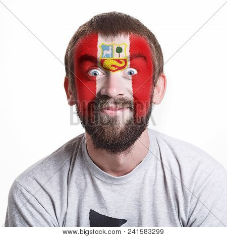 Face Of Young Cheerful Man Painted With Flag Of Peru. Football Or Soccer Team Fan, Sport Event, Face