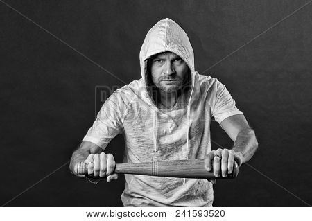 Bearded Man Threaten With Bat Weapon. Hooligan Wear Hood In Hoodie Tshirt. Gangster Guy Hold Basebal