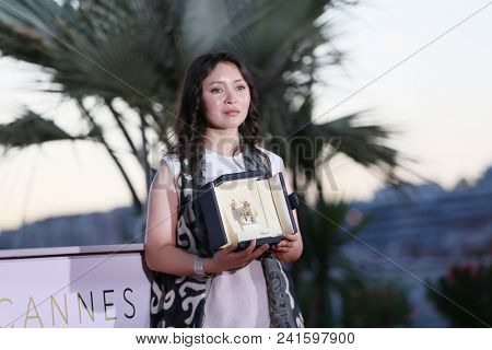 Actress Samal Yeslyamova attends the photocall the Palme D'Or Winner during the 71st Cannes Film Festival at Palais on May 19, 2018 in Cannes, France. 