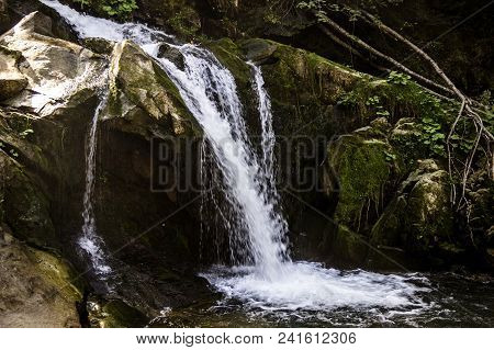 View Of Kamianetskyi Waterfall Is Located On The Kamianka River (a Right Tributary Of The Opir River