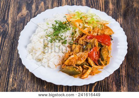 Food Cuisine Rice With Chiken. Chinese Or Thai Rice Topped With Chiken