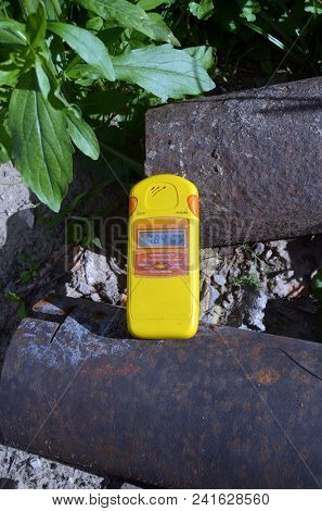Metal of the Chernobyl Zone for export to Europe. The radiometer gives readings in micro-Sieverts. Logos removed