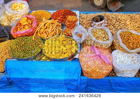 Display Of Snacks At Kinari Bazaar In Agra, Uttar Pradesh, India. Kinari Bazar Was Built In The 17th