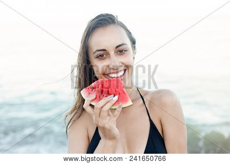 Summer Vacation - Young Girl Eating Fresh Watermelon On Sandy Beach
