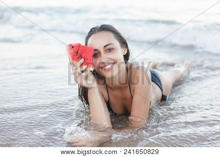 Summer Vacation - Young Girl Eating Fresh Watermelon On Sandy Beach