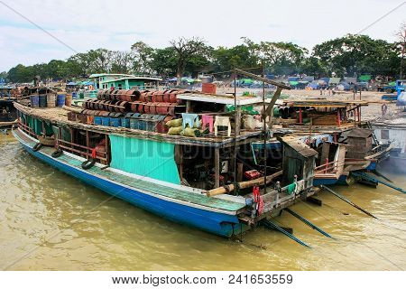 Barges Anchored At Ayeyarwady River Port In Mandalay, Myanmar. Ayeyarwady River Is The Largest River
