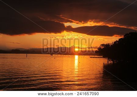 A Golden Sunset Across The Hastings River From The North Shore At Port Macquarie - Nsw Australia. Po