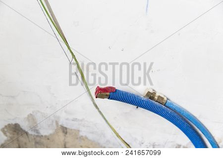 Water Pipes Made Of Polypropylene Pex In The Wall, Plumbing In The House. Installation Of Sewer Pipe