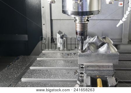 The Cnc Milling Machine Cutting The Metal Mold Part With The Index-able  Ball Endmill  Tool. High Te