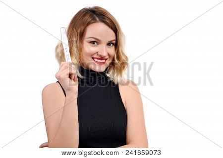 Happy Woman Showing A Positive Pregnancy Test