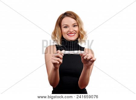Happy Woman Showing A Positive Pregnancy Test